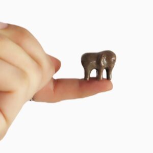 Green Elephant on finger