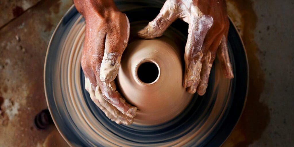 Making a pot on the pottery wheel 21